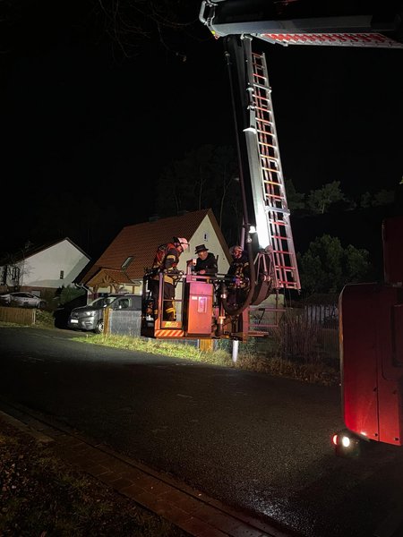 Schornsteinfeger im Fahrkorb